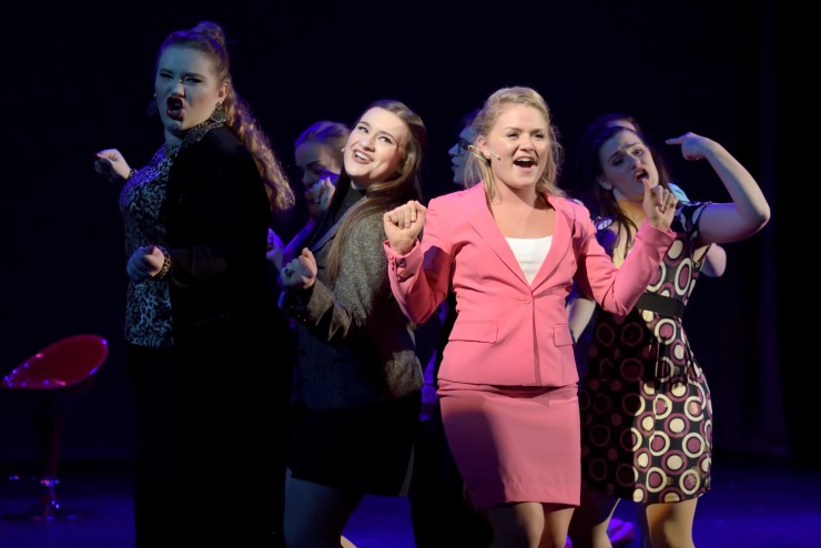 Dean College students on stage during a theatre performance