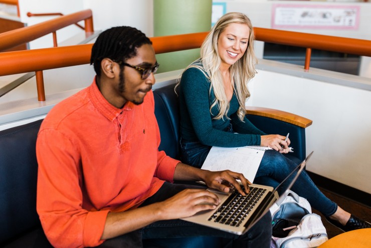 Dean College students working together inside the Dean College Campus Center