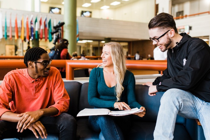 Happy Students Talking to Each Other