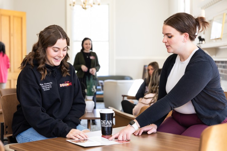 Counselor providing advice to student in Ray House
