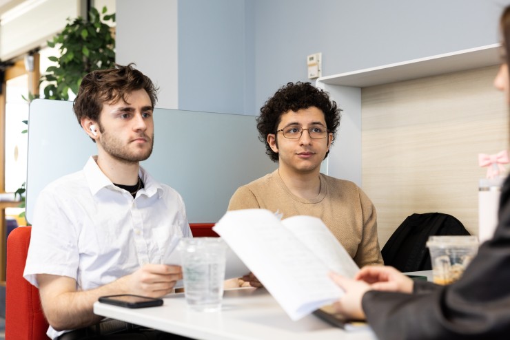 Student listening intently to friend