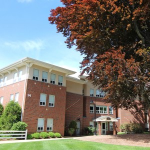 Students walking on campus during a beautiful spring day