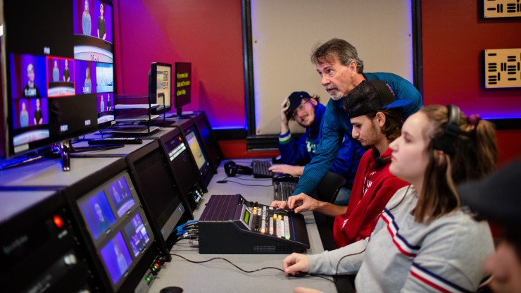 Communications program majors working in the television studio