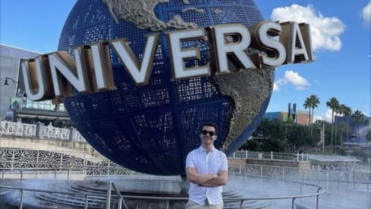 Student standing in front of Universal Studios