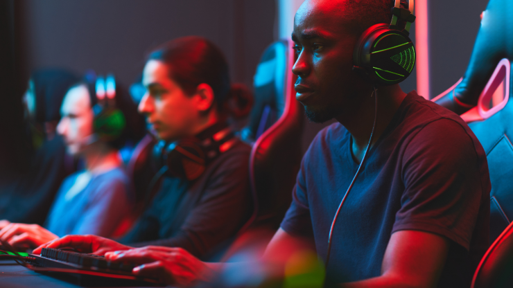 Shoutcasters working at a computer 