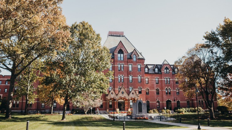 Dean Hall, Dean's most iconic building located on the Dean College campus, on a fall day.