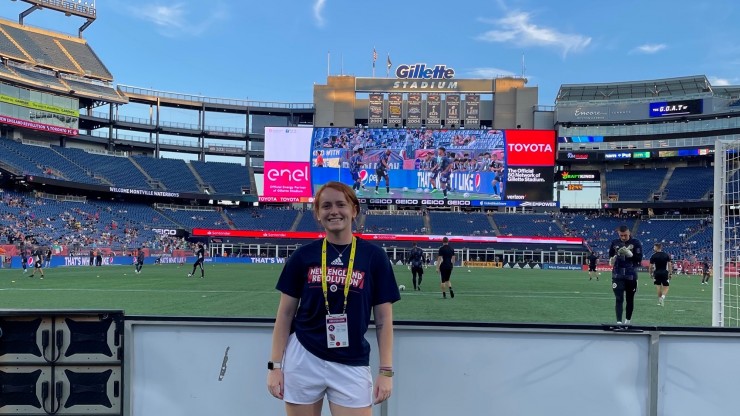 Ƶ student on the field at Gillette Stadium for New England Revolution game