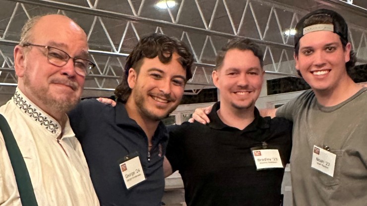 alumni gathered at event