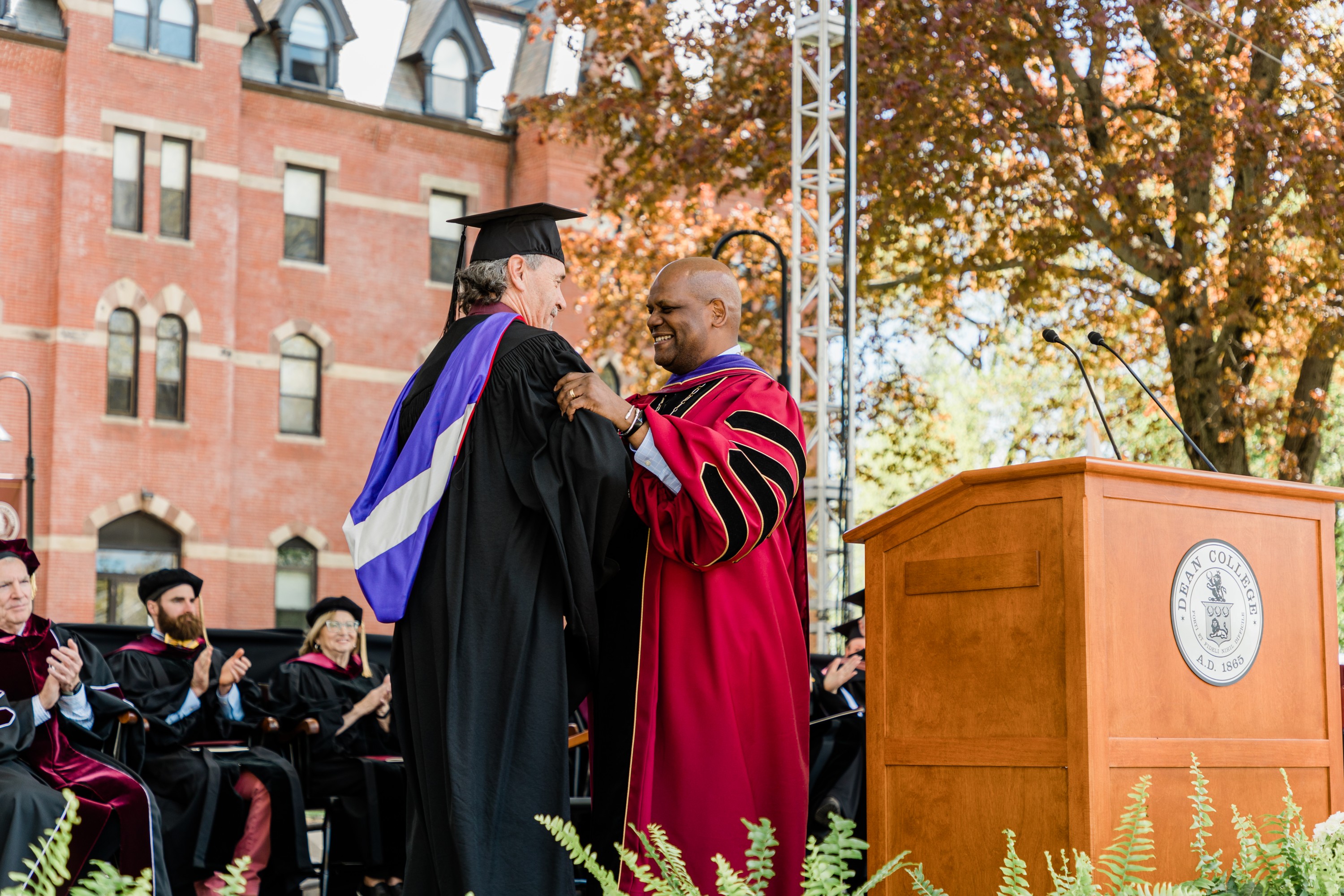 Professor Seibert receiving award from President Elmore at Commencement